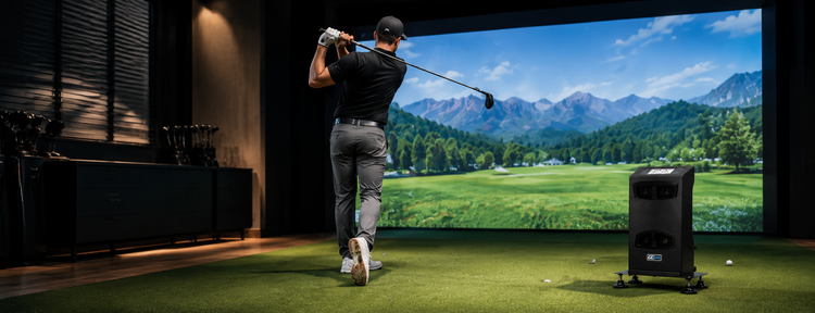 Golfer swinging in upscale home golf simulator room with launch monitor and protective case